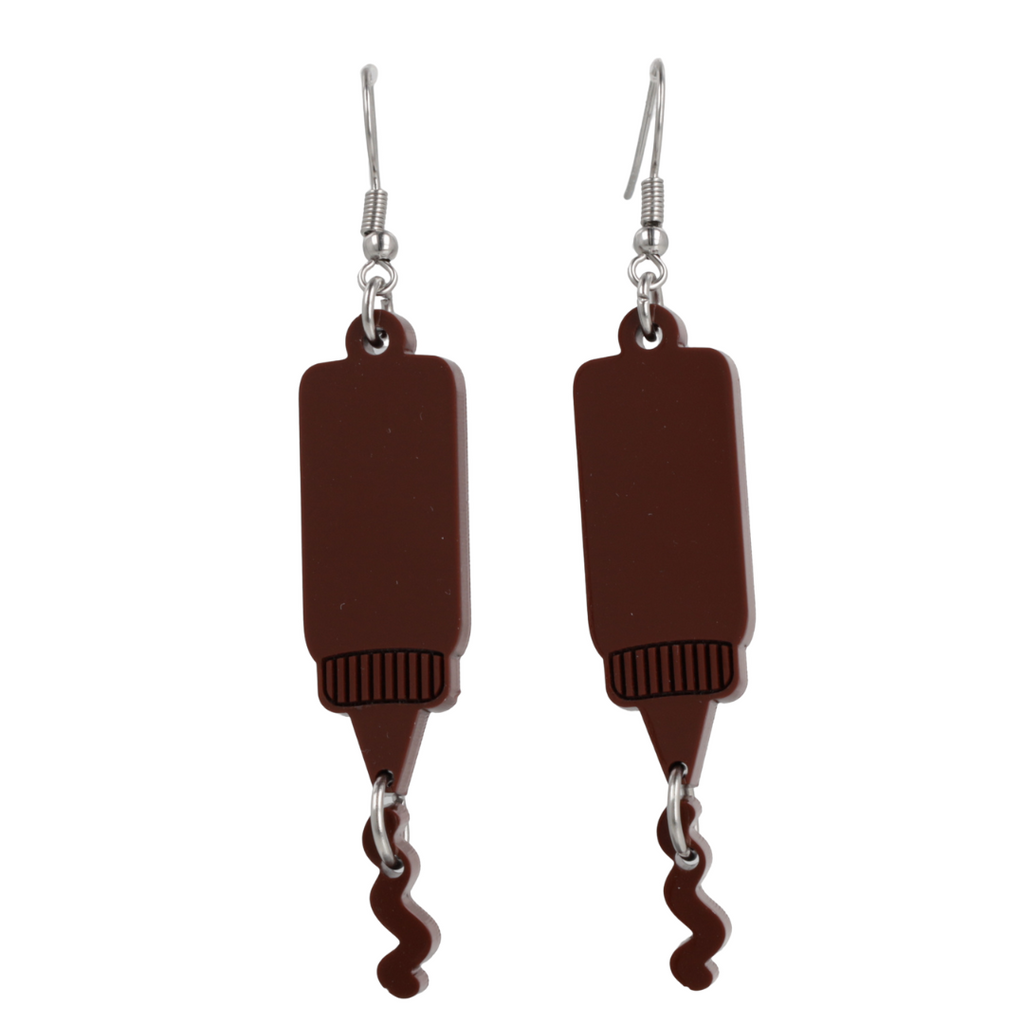 Stainless steel earwires featuring barbecue sauce acrylic charms with a charm joined to the bottle showing sauce coming out of it