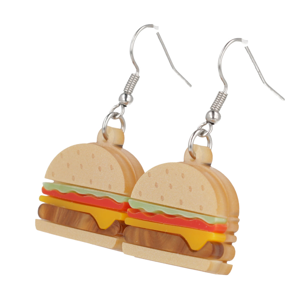 Cheeseburger acrylic charms featuring a beige bun and brown marble patty with lettuce and tomato with stainless steel earwires