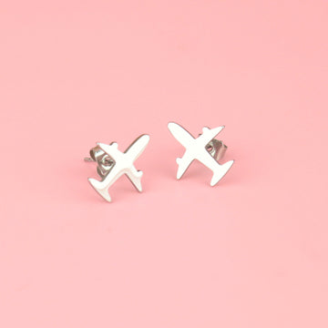 two aeroplane shaped studs 