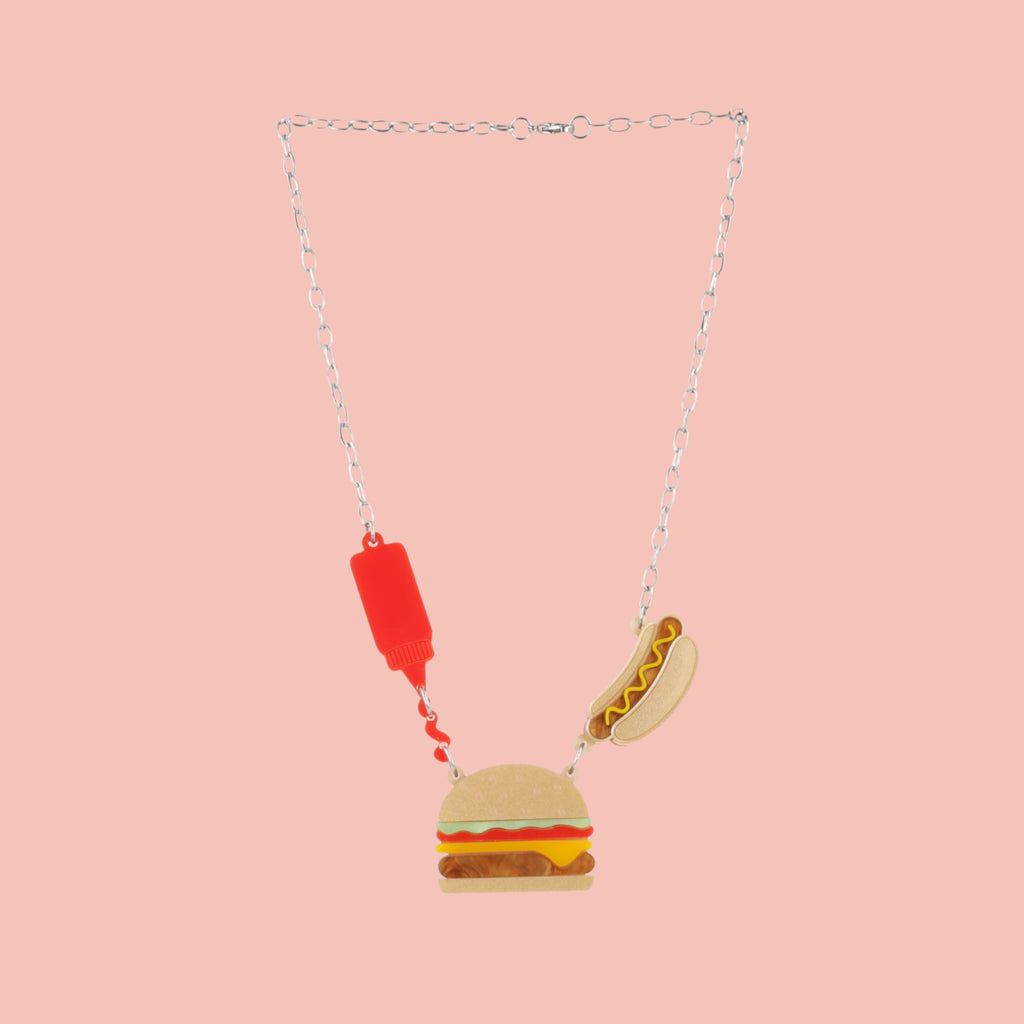 Stainless steel oval link chain with a kethup, cheeseburger and mustard hot dog pendant