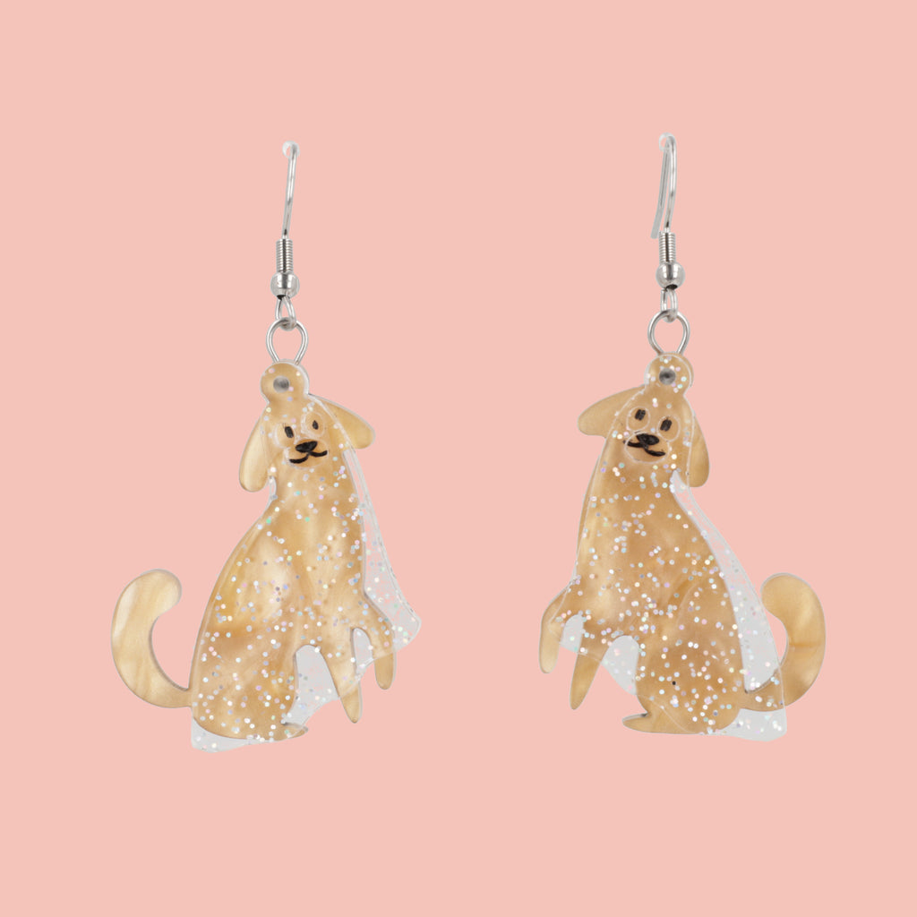 Dog charms with an extra layer of holographic glitter to replicate a ghost n stainless steel earwires