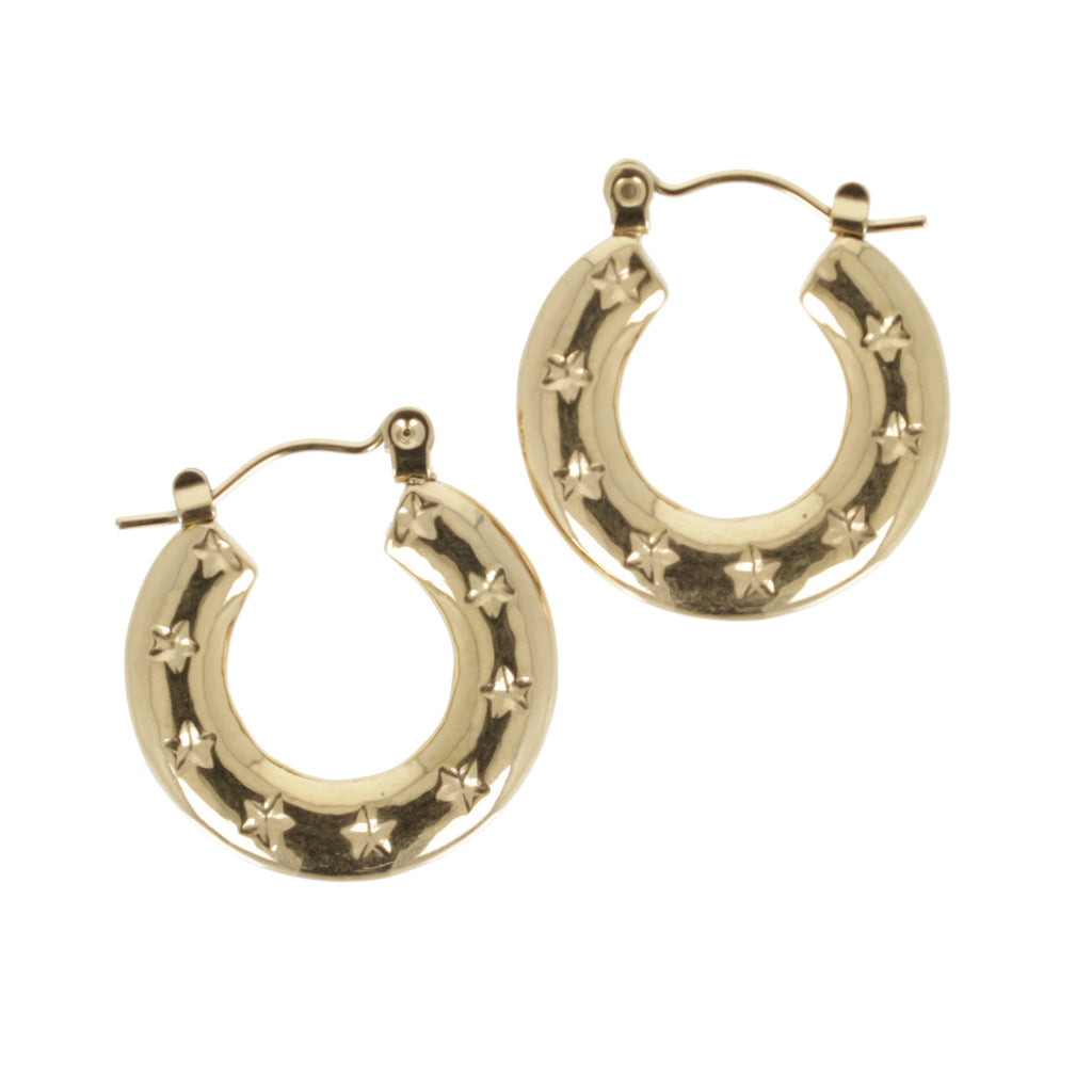 Gold horseshoe-shaped earring with stars surrounding the horsehoe