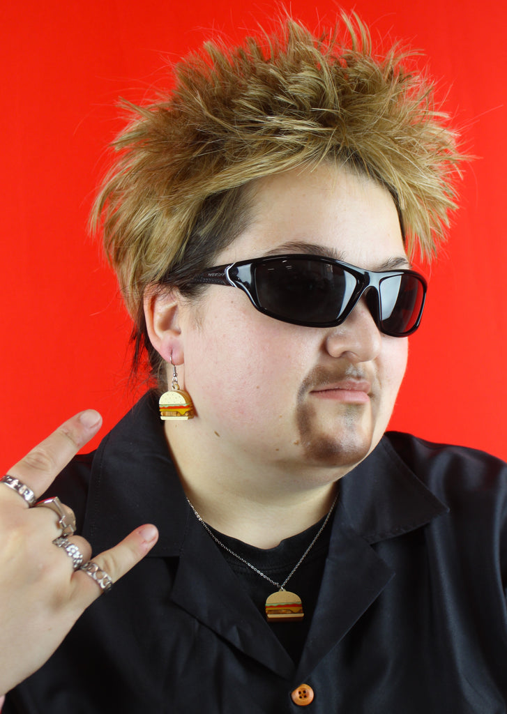 Model wearing Acrylic Burger pendant featuring lettuce, tomato and cheese on a stainless steel chain with matching earrings