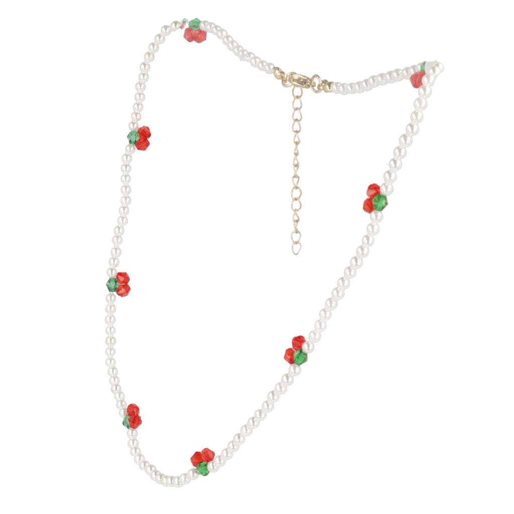 faux pearl beads and cherry charms with a gold plated stainless steel clasp