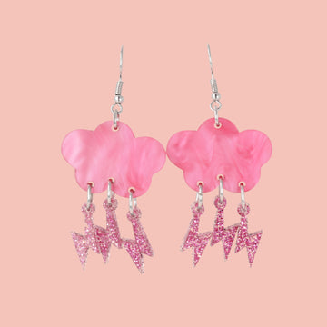 Hot pink marble acrylic clouds attached to pink glitter lightning bolts on stainless steel earwires