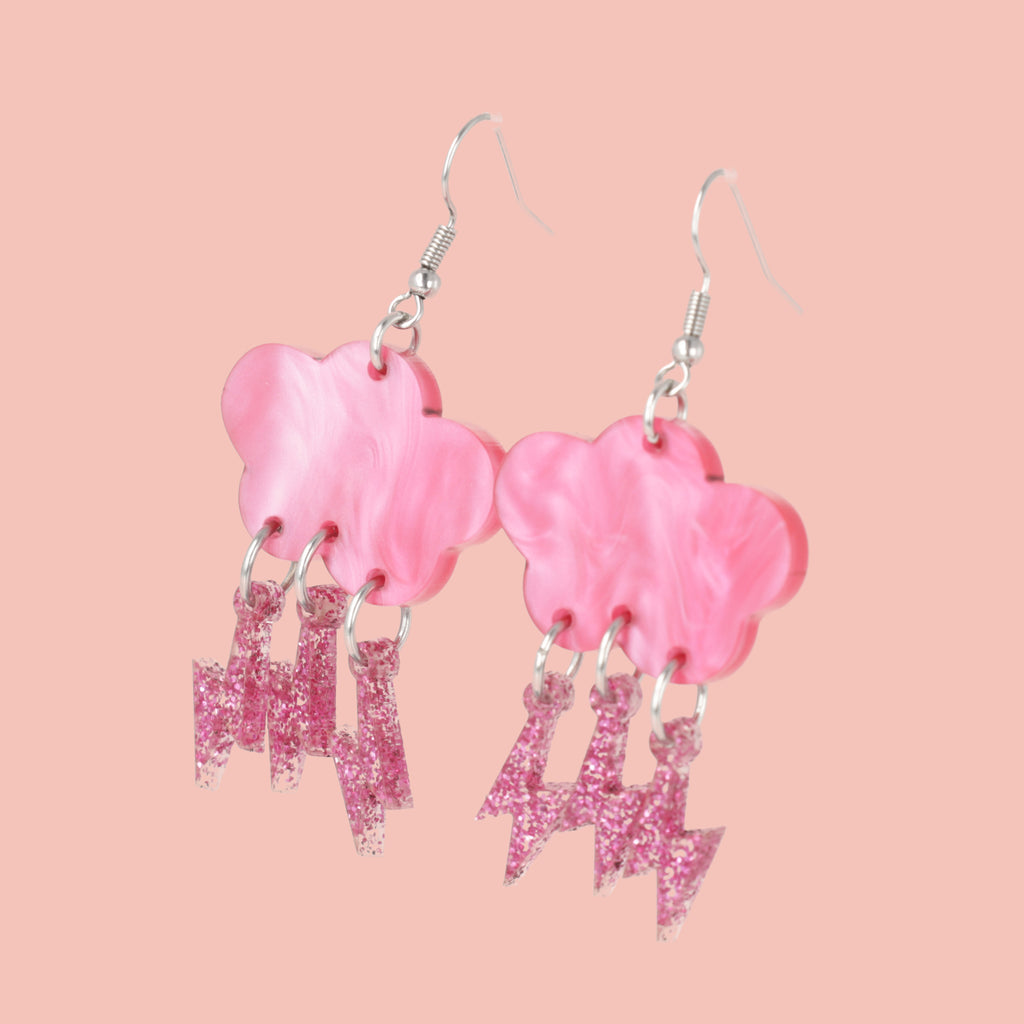 Hot pink marble acrylic clouds attached to pink glitter lightning bolts on stainless steel earwires