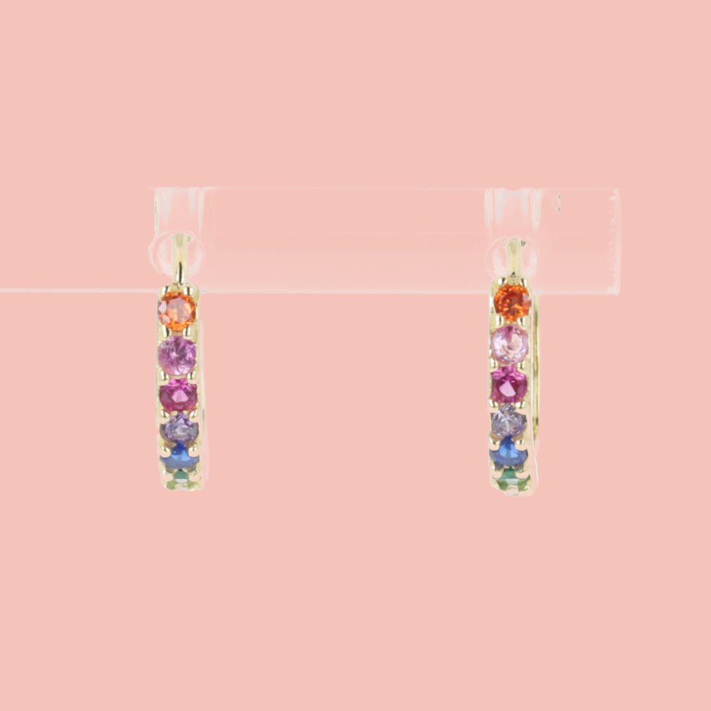 Orange, pink, purple, blue and green gemstones on a gold plated sterling silver hoop