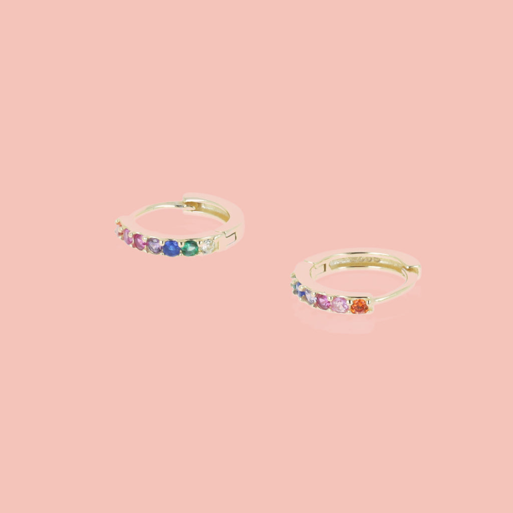 Orange, pink, purple, blue and green gemstones on a gold plated sterling silver hoop