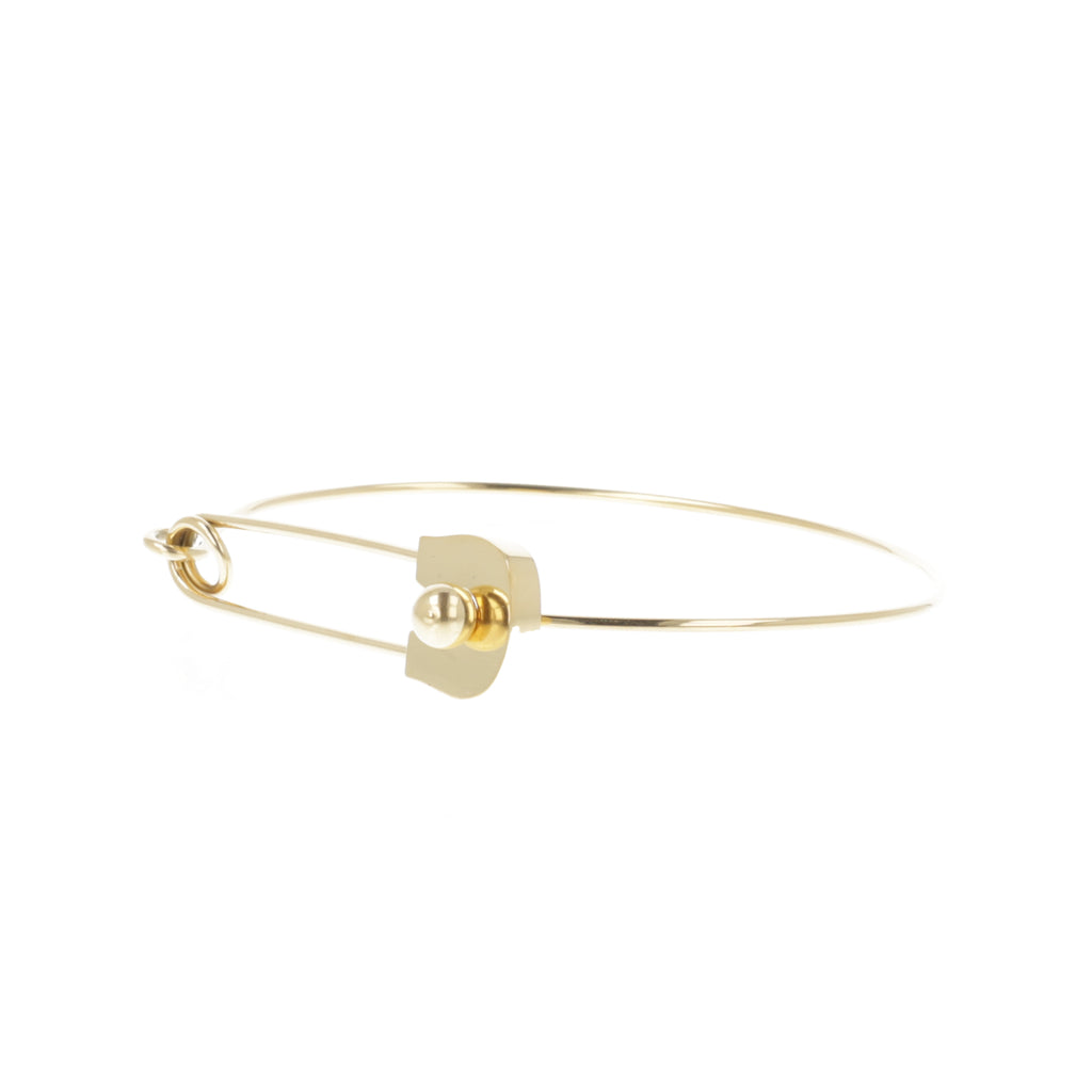 Gold plated stainless steel bangle witha safety pin fastening