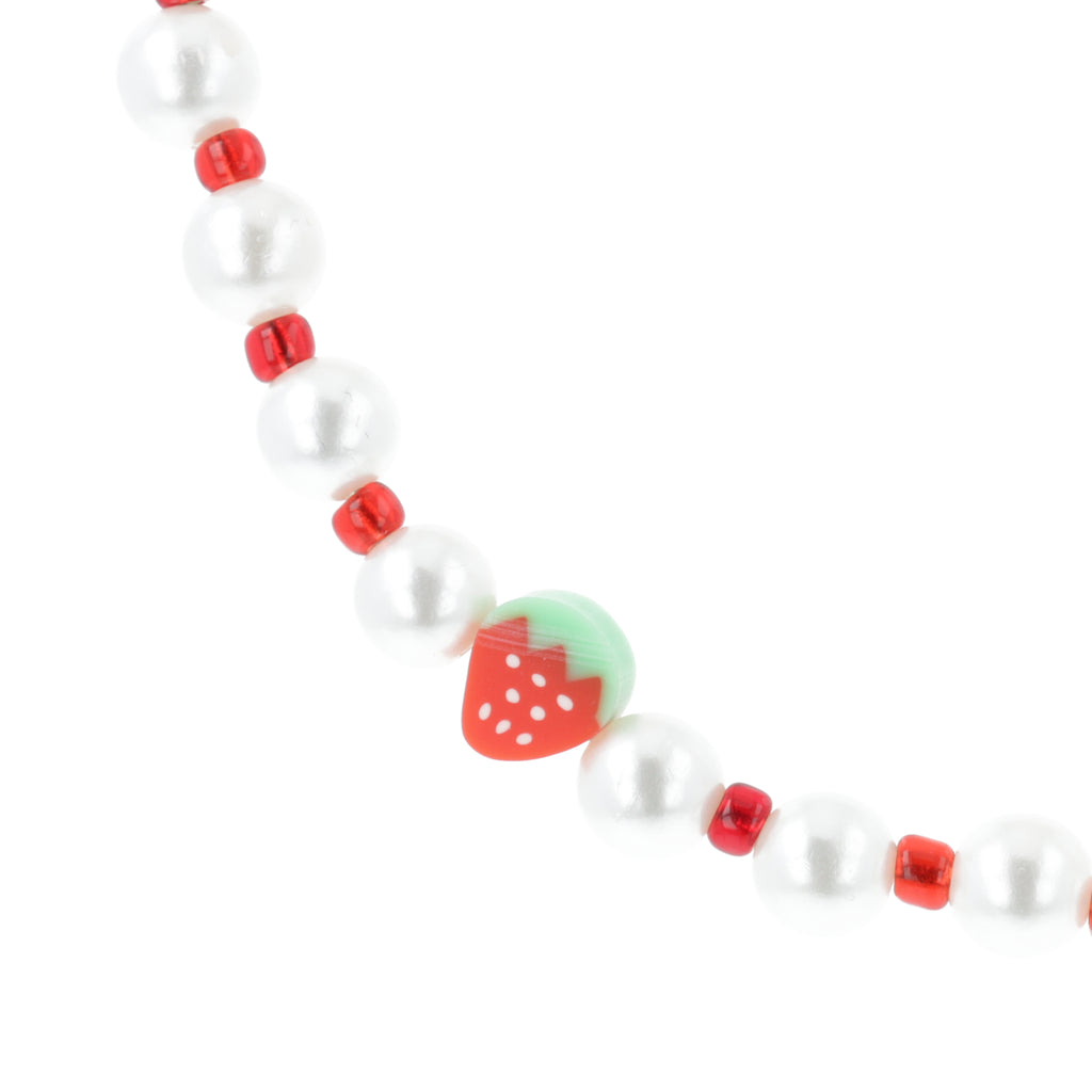 Faux pearl necklace featuring red beads and strawberry charms with a base metal clasp