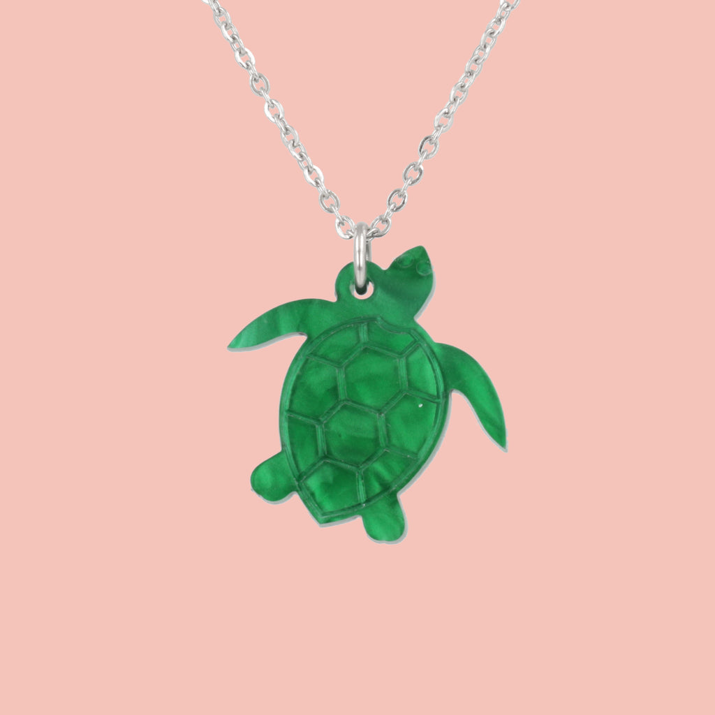 Green marble turtle pendant on a stainless steel chain