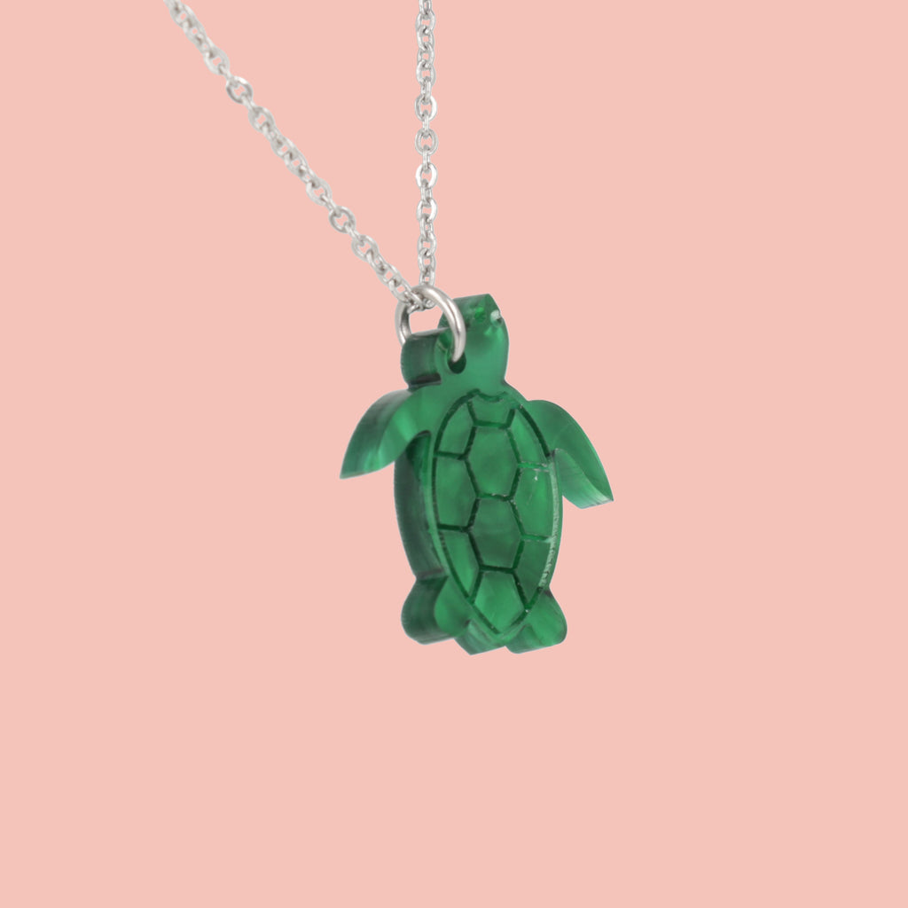 Green marble turtle pendant on a stainless steel chain