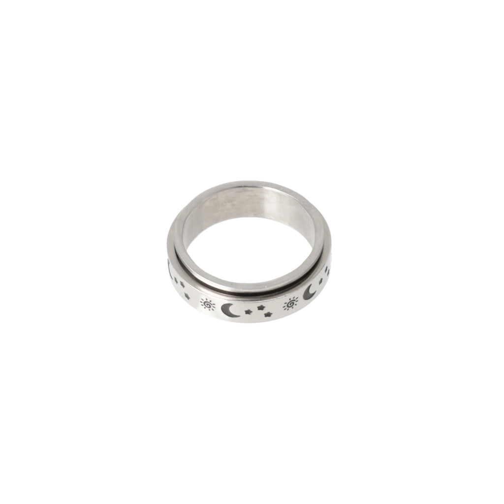 Titanium ring with a black sun, moon and stars design