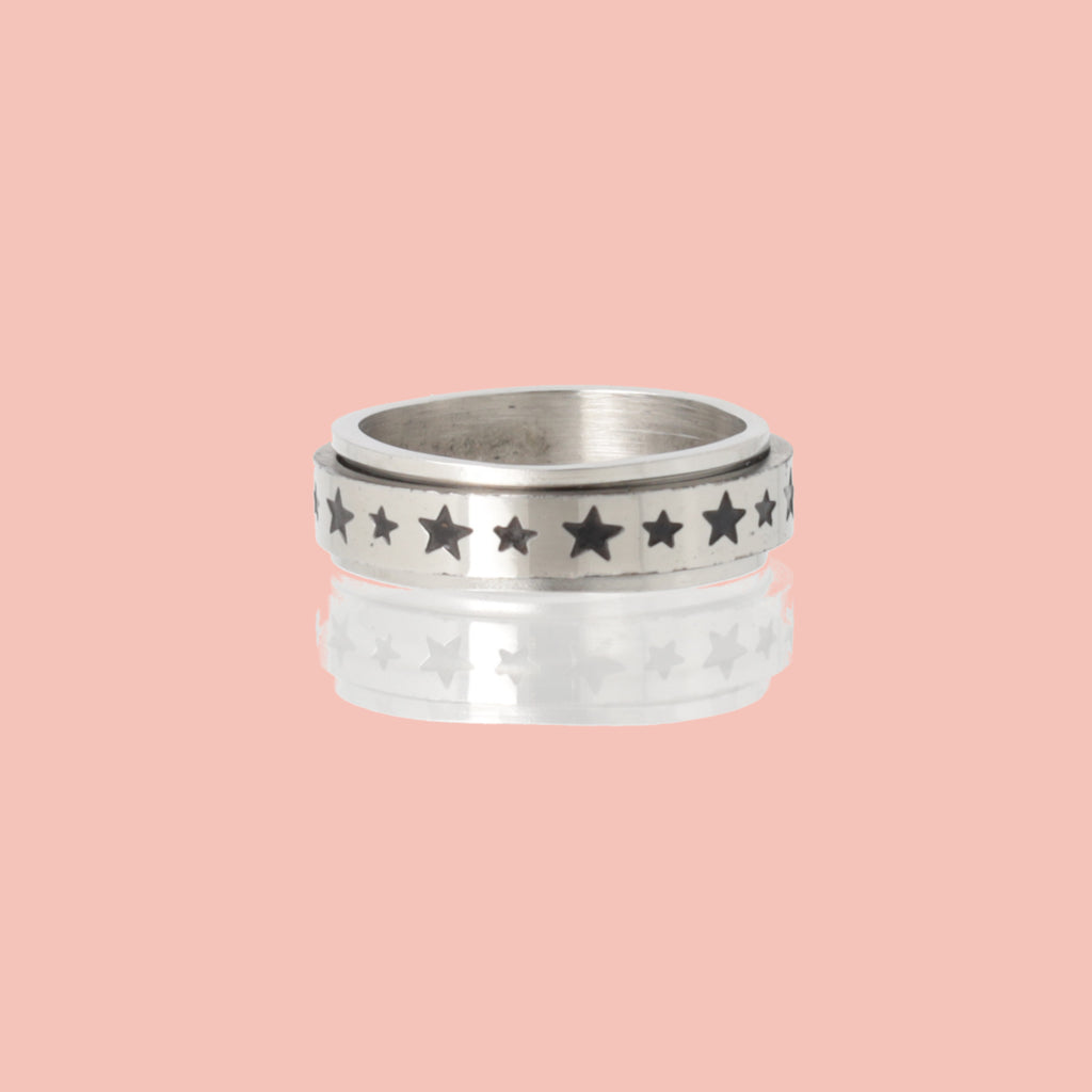 Titanium spinny ring with black stars on