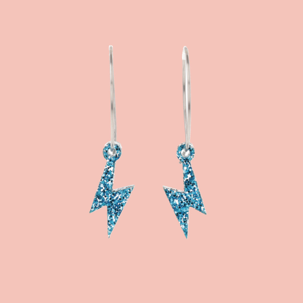 Mini Blue Glitter Lightning Bolt charms on stainless steel hoops