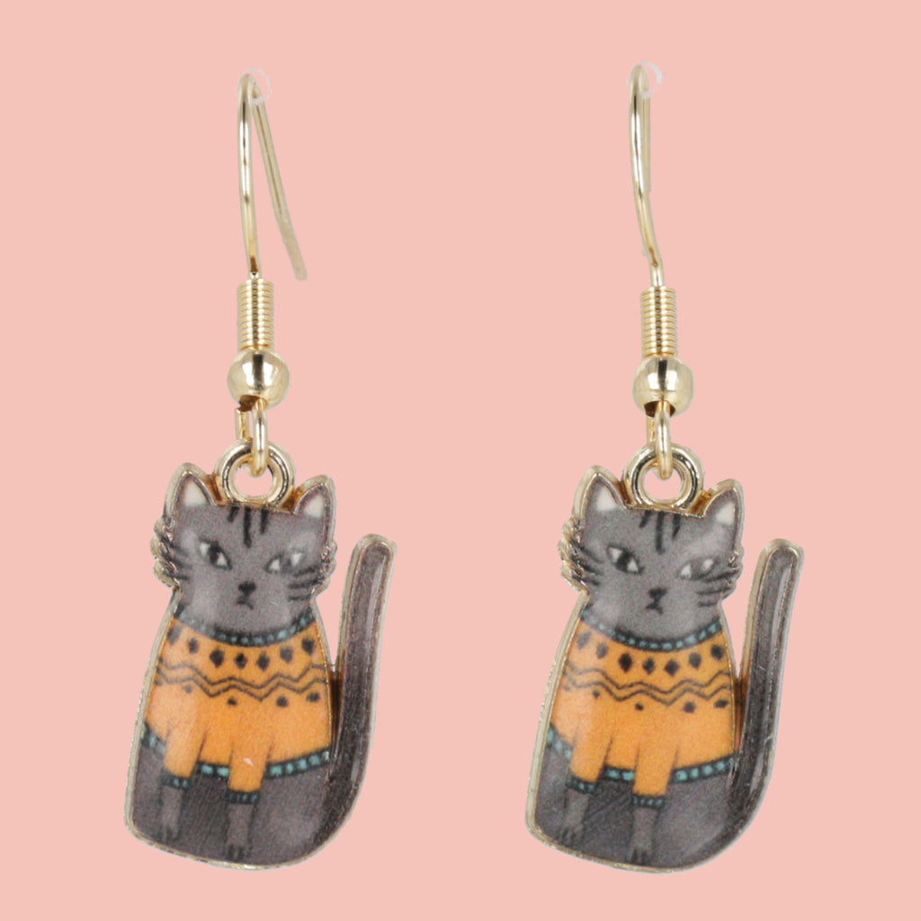 Charms featuring a grey cat with an orange jumper on gold plated stainless steel earwires