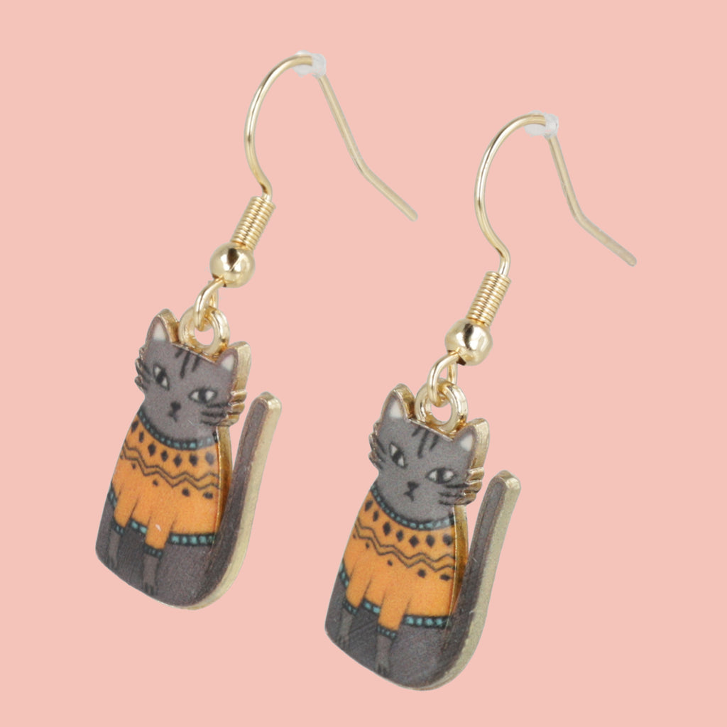 Charms featuring a grey cat with an orange jumper on gold plated stainless steel earwires