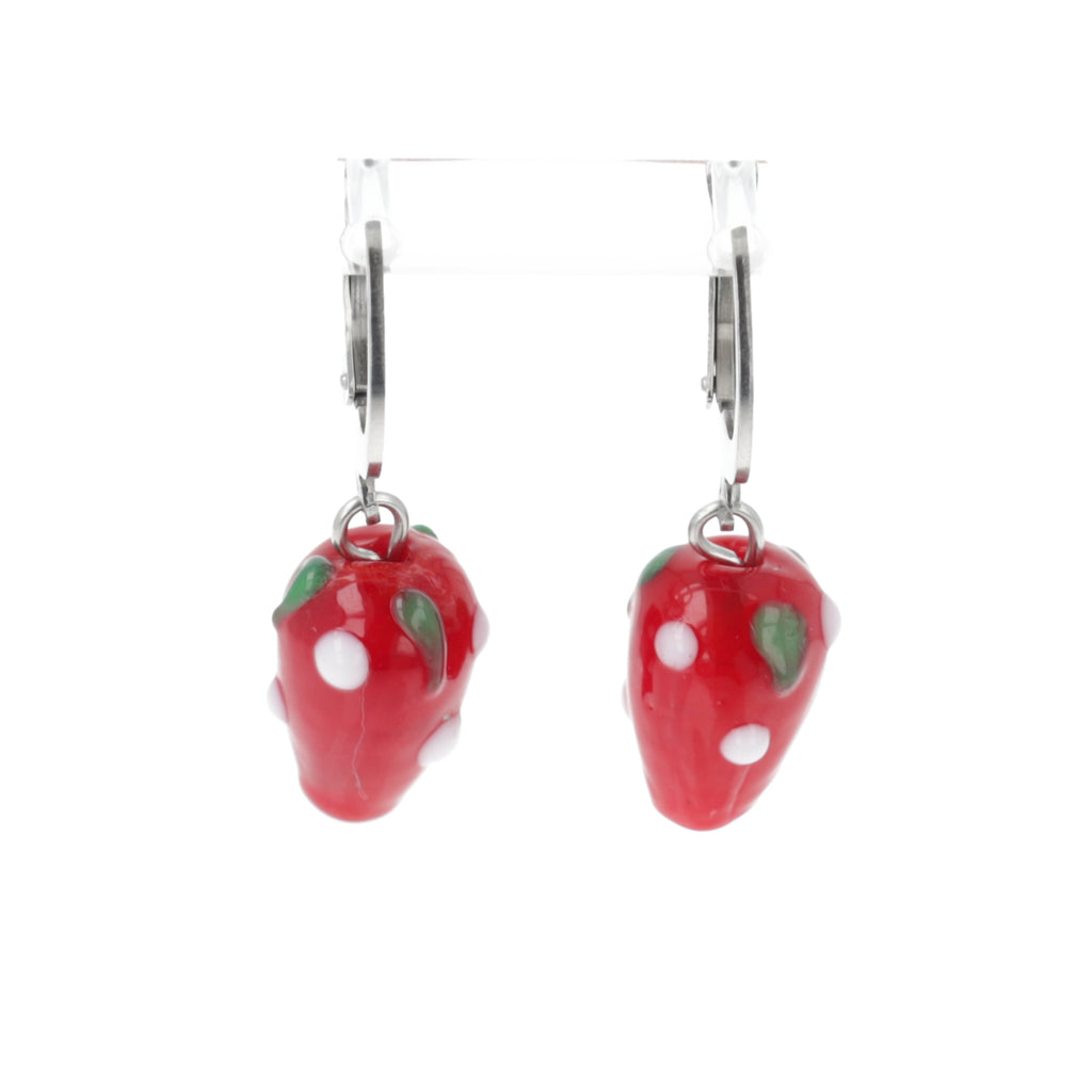 Glass strawberry charms on stainless steel huggie hoops