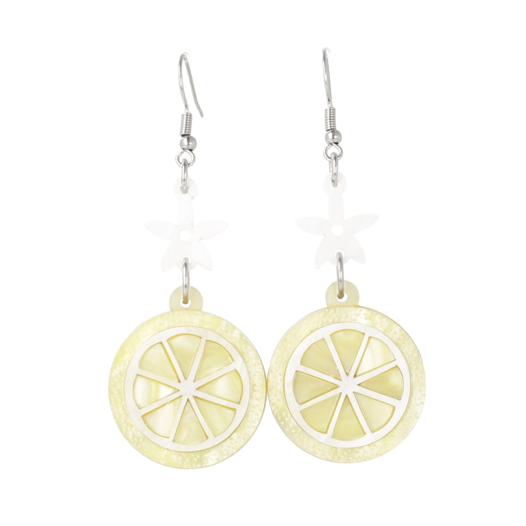 Lemon slice charms suspended fromn white flower charms on stainless steel earwires