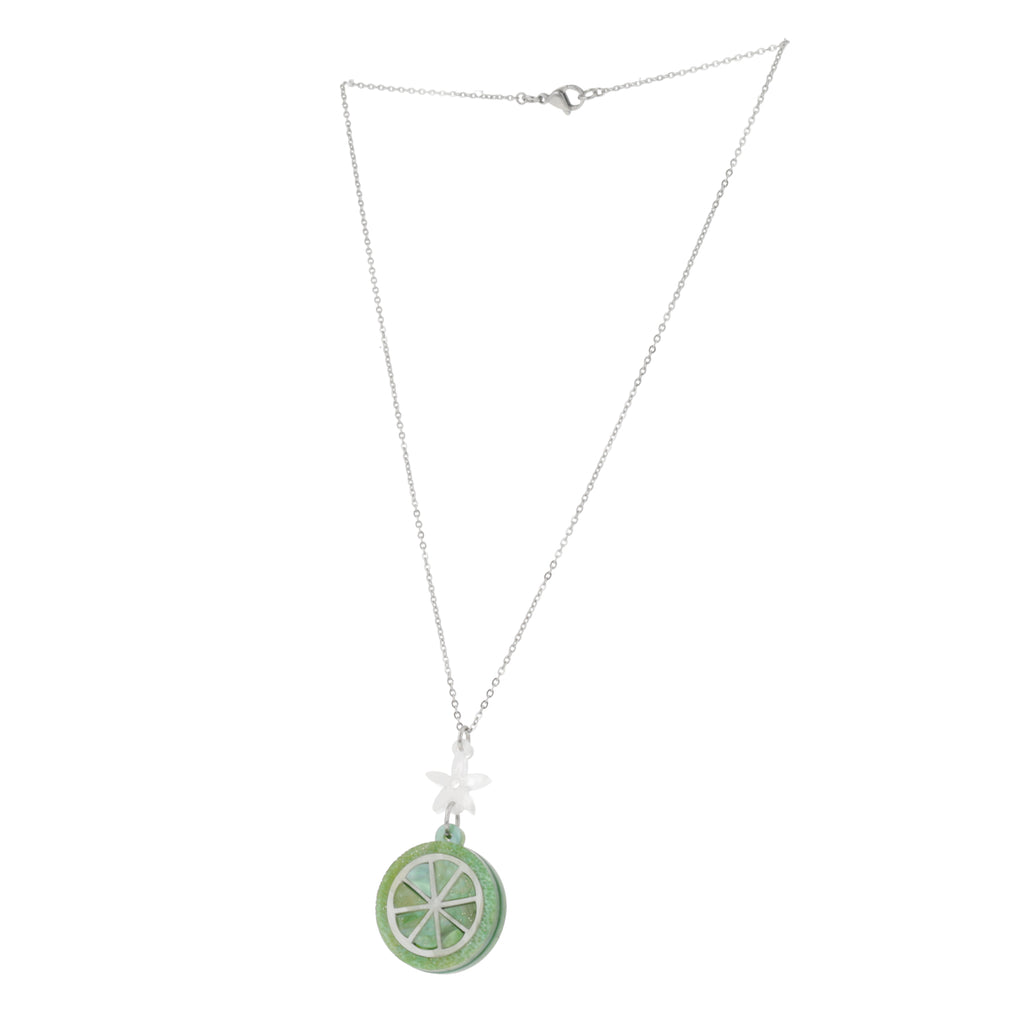 Lime slice pendant suspended rom a white flower and stainless steel chain