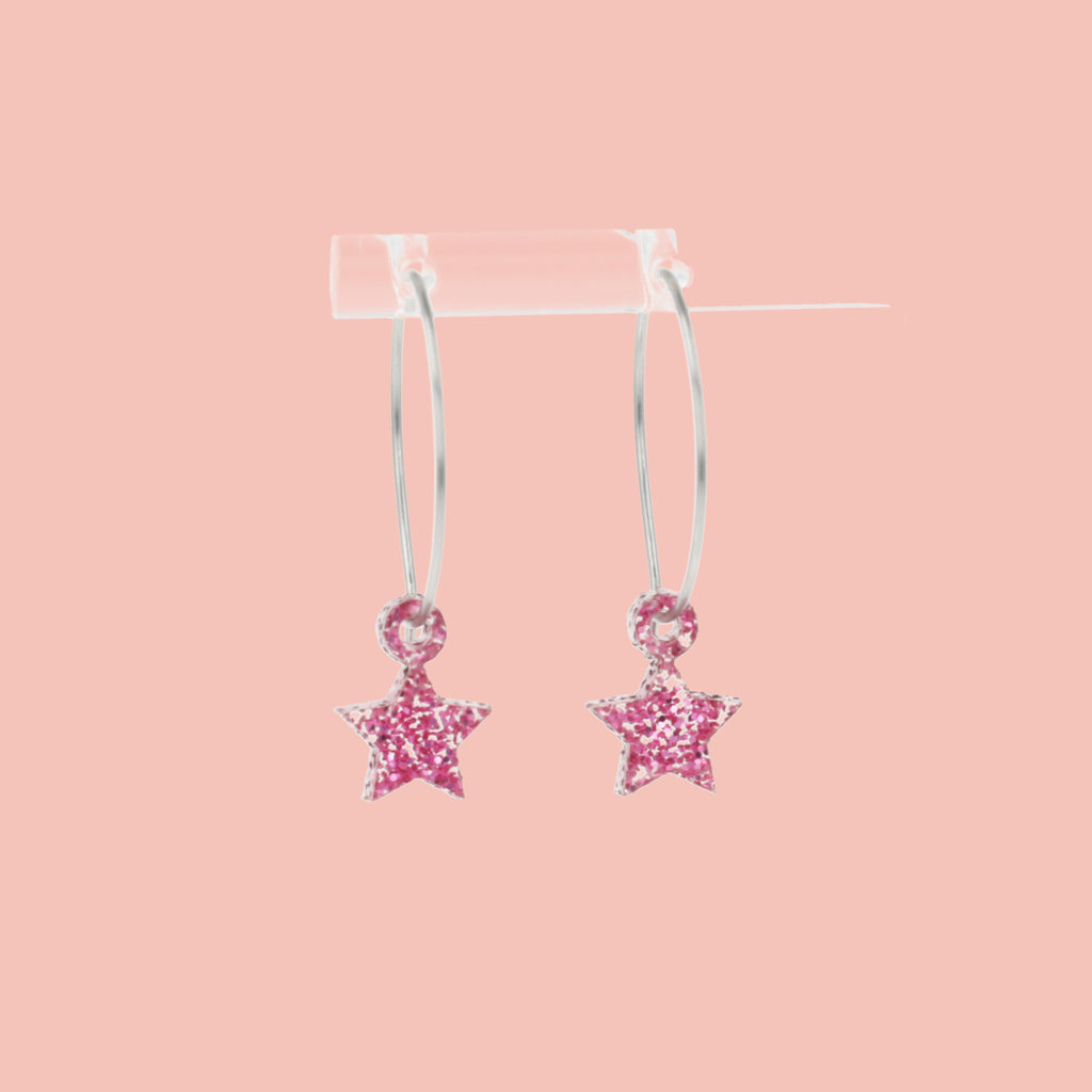 Mini pink glitter acrylic star charms on stainless steel hoops