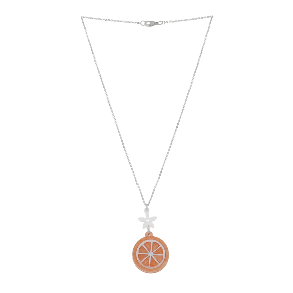 Orange slice pendant suspended from a white flower charm on a stainless steel chain