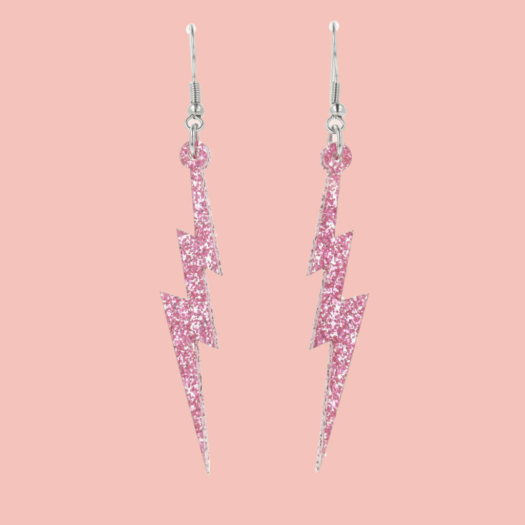 Pink glitter acrylic lightning bolt charms on stainless steel earwires