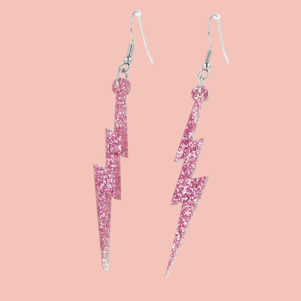 Pink glitter acrylic lightning bolt charms on stainless steel earwires