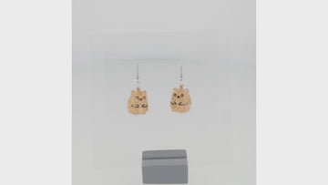 360 view of hamster charms with a layer of holographic glitter to replicate a ghost on stainless steel earwires