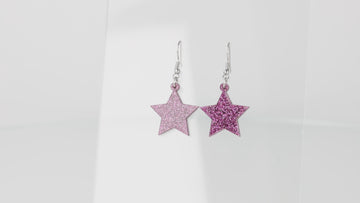 Purple glitter acrylic star charms on stainless steel earwires360 view of 