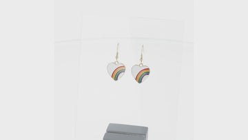 White heart charms with rainbows on them, on gold plated stainless steel earwires