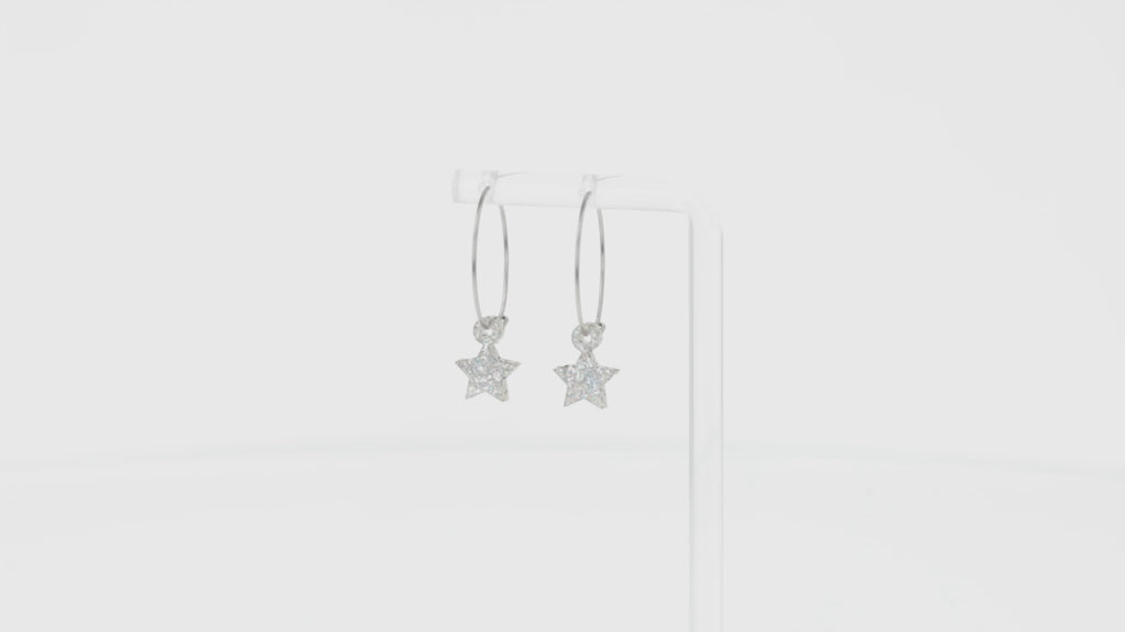 360 view of Mini silver glitter acrylic star charms on stainless steel hoops