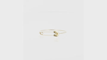 Gold plated stainless steel bangle witha safety pin fastening