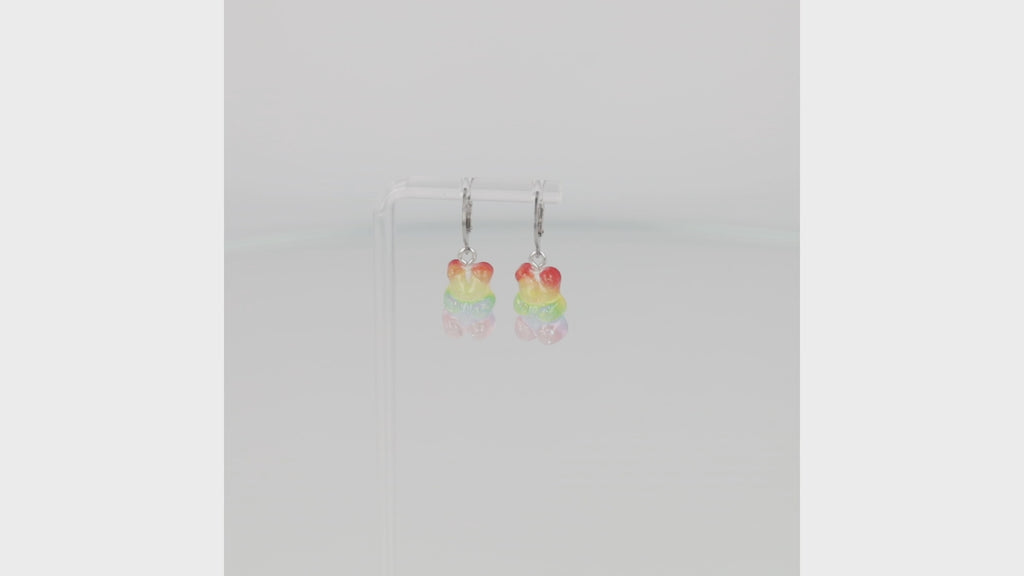 360 view of bSparkly rainbow gummy bear charms on stainless steel huggie hoops