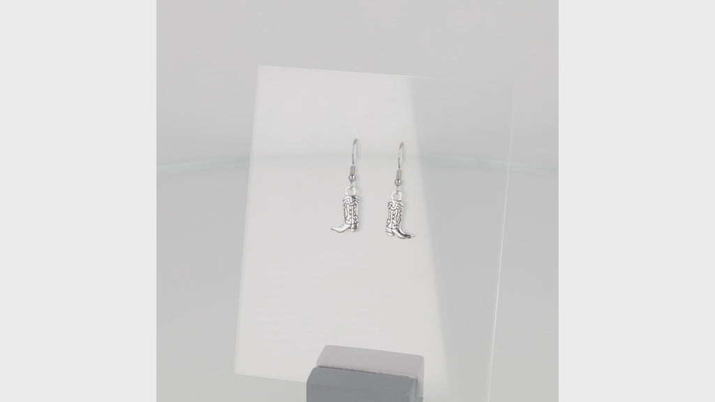 Silver cowboy boot charms on stainless steel earwires