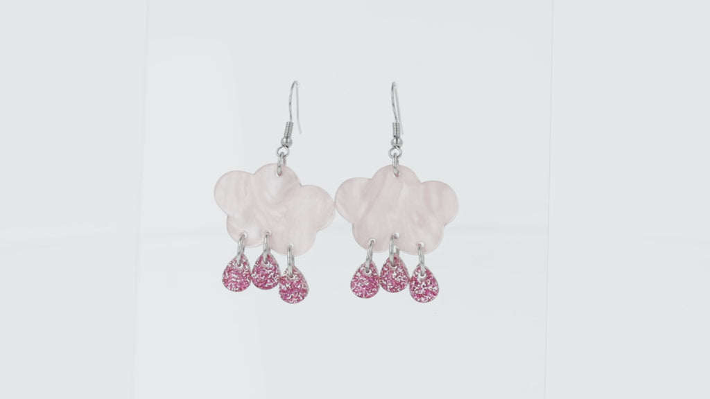 360 view of acrylic baby pink marble clouds and pink glitter acrylic raindrop charms on stainless steel earwires