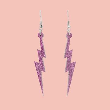 Purple glitter acrylic lightning bolt charms on stainless steel earwires