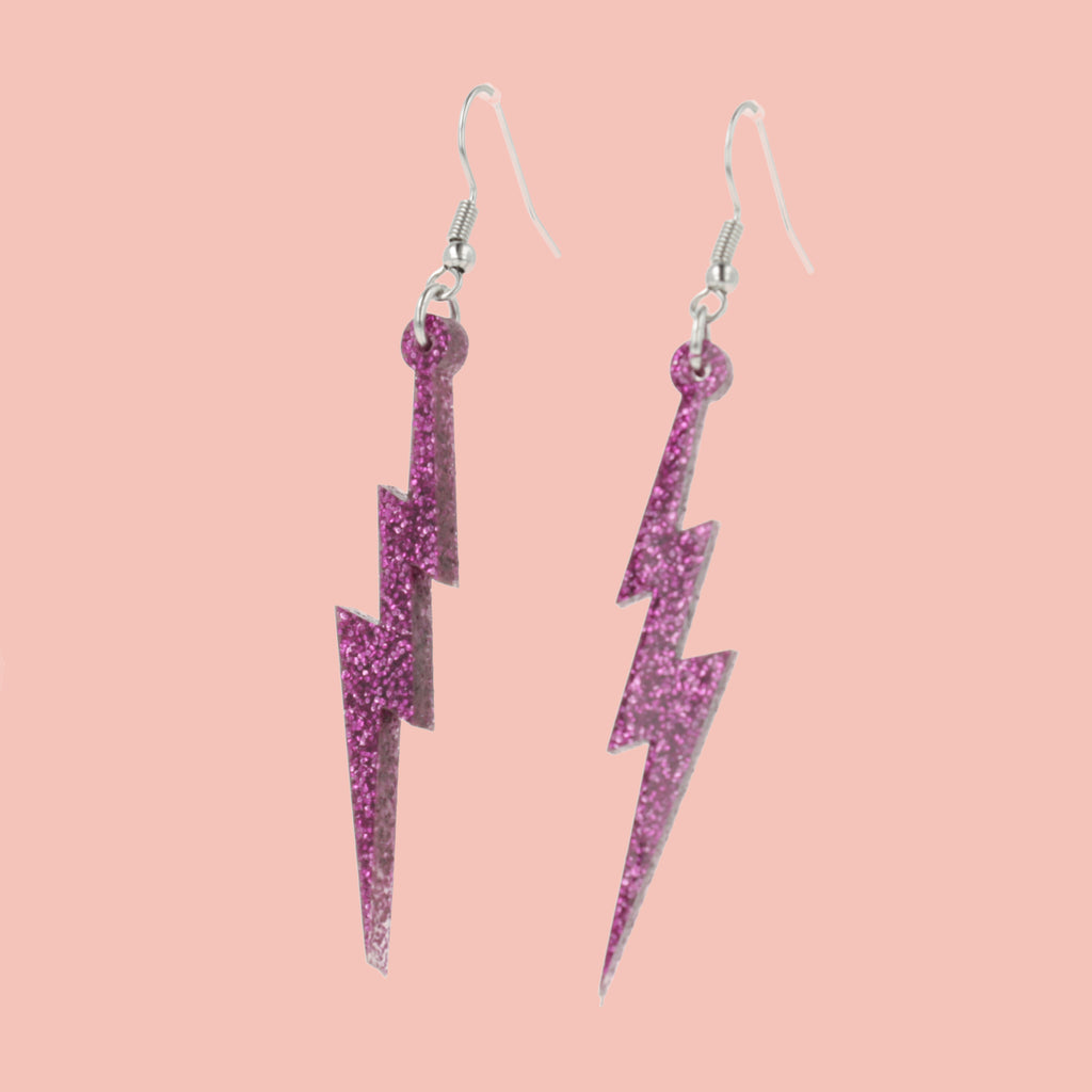 Purple glitter acrylic lightning bolt charms on stainless steel earwires