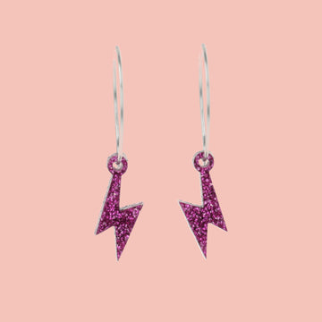 Mini Purple Glitter Lightning Bolt charms on stainless steel hoops