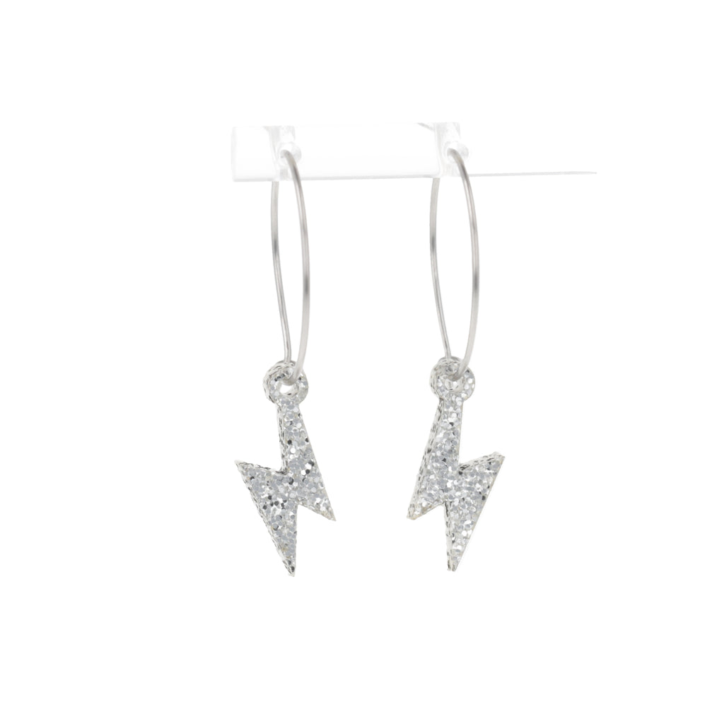 Mini Silver Glitter Lightning Bolt charms on stainless steel hoops