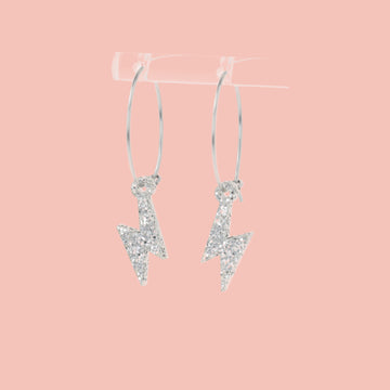 Mini Silver Glitter Lightning Bolt charms on stainless steel hoops