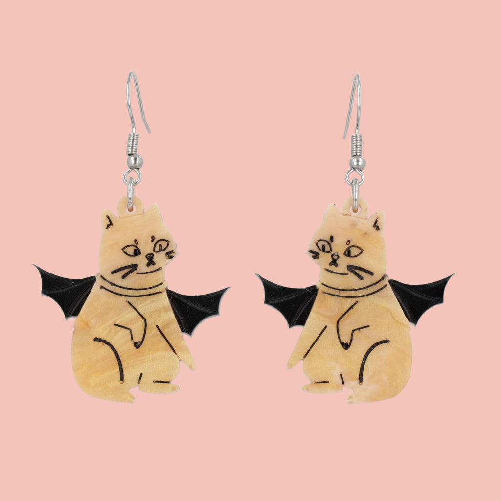 Ginger cat charm with bat wings on stainless steel earwires