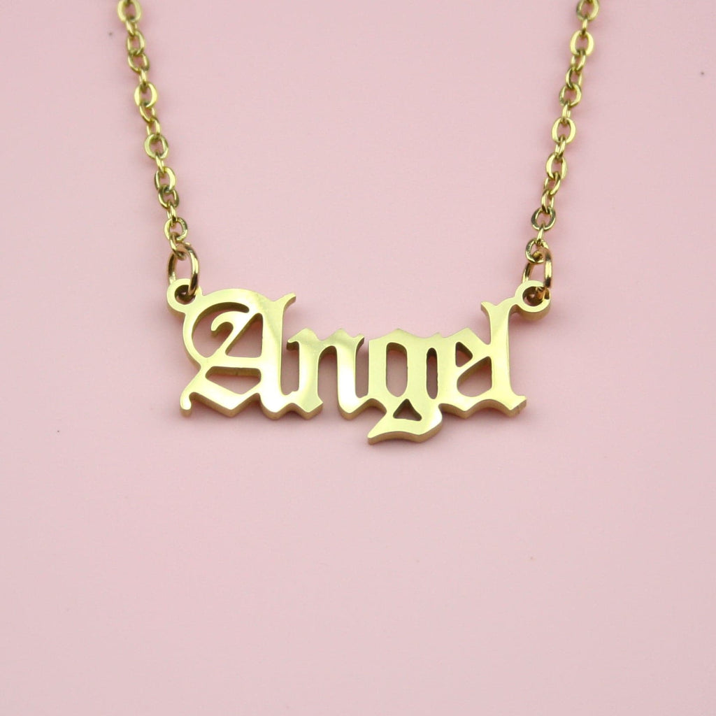 Gold plated stainless steel necklace with the word 'angel' written in a gothic font