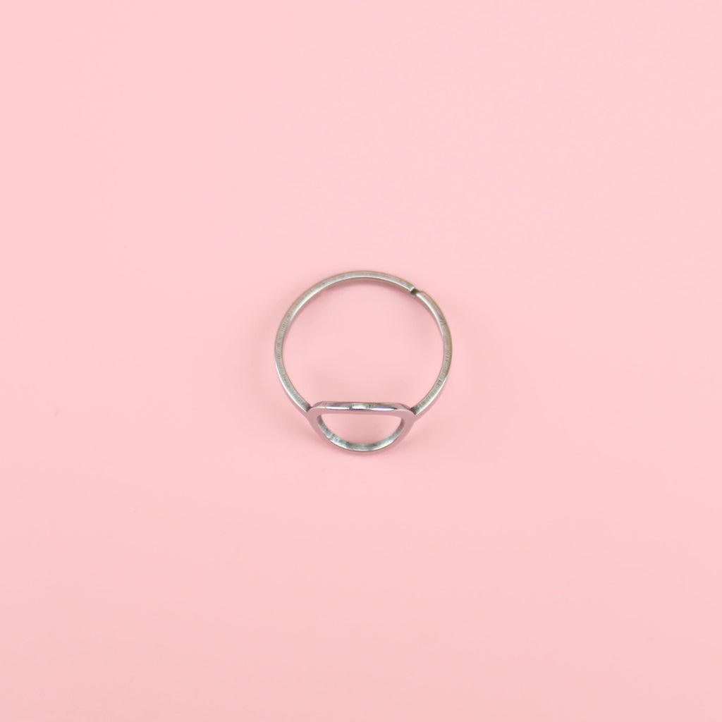 Stainless steel ring with cut out circle design