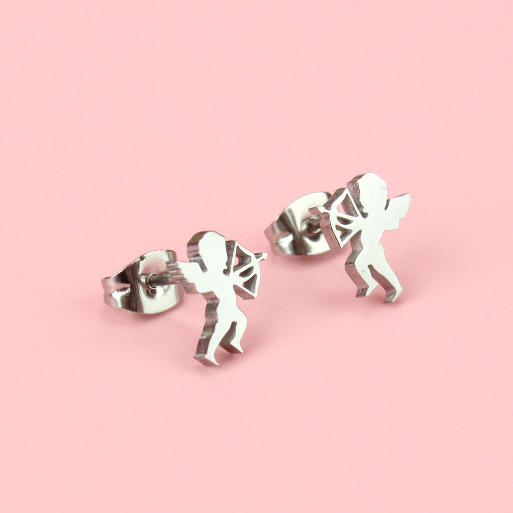 Stainless steel studs in the shape of a cherub with a bow and arrow